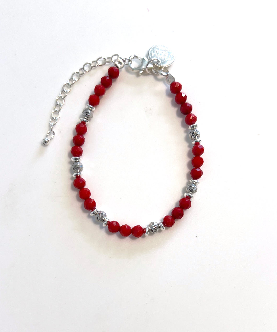 Red Coral Bracelet with Facetted Coral Beads and Sterling Silver