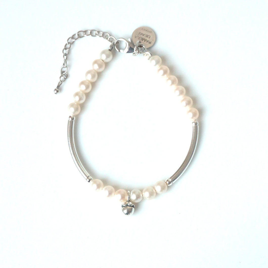 White Pearl Bracelet with Sterling Silver Curves and Charm