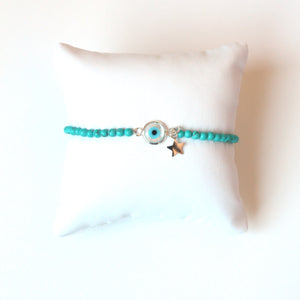 Turquoise Bracelet with Evil Eye and Sterling Silver Charm
