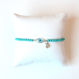 Turquoise Bracelet with Evil Eye and Mother of Pearl Heart Charm