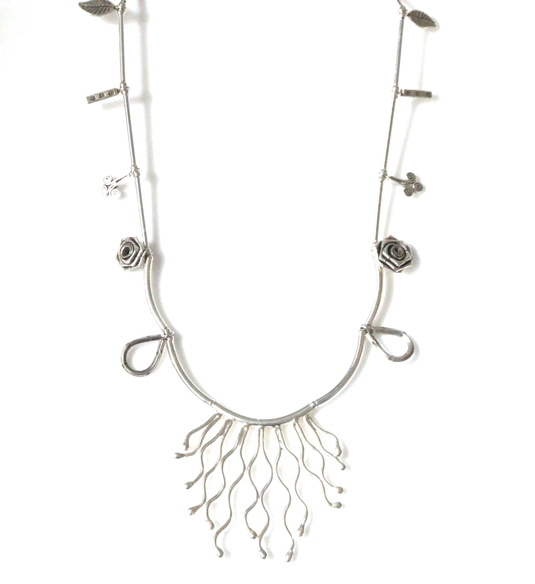 Sterling Silver Necklace with Unusual Centrepiece and Multiple Charms